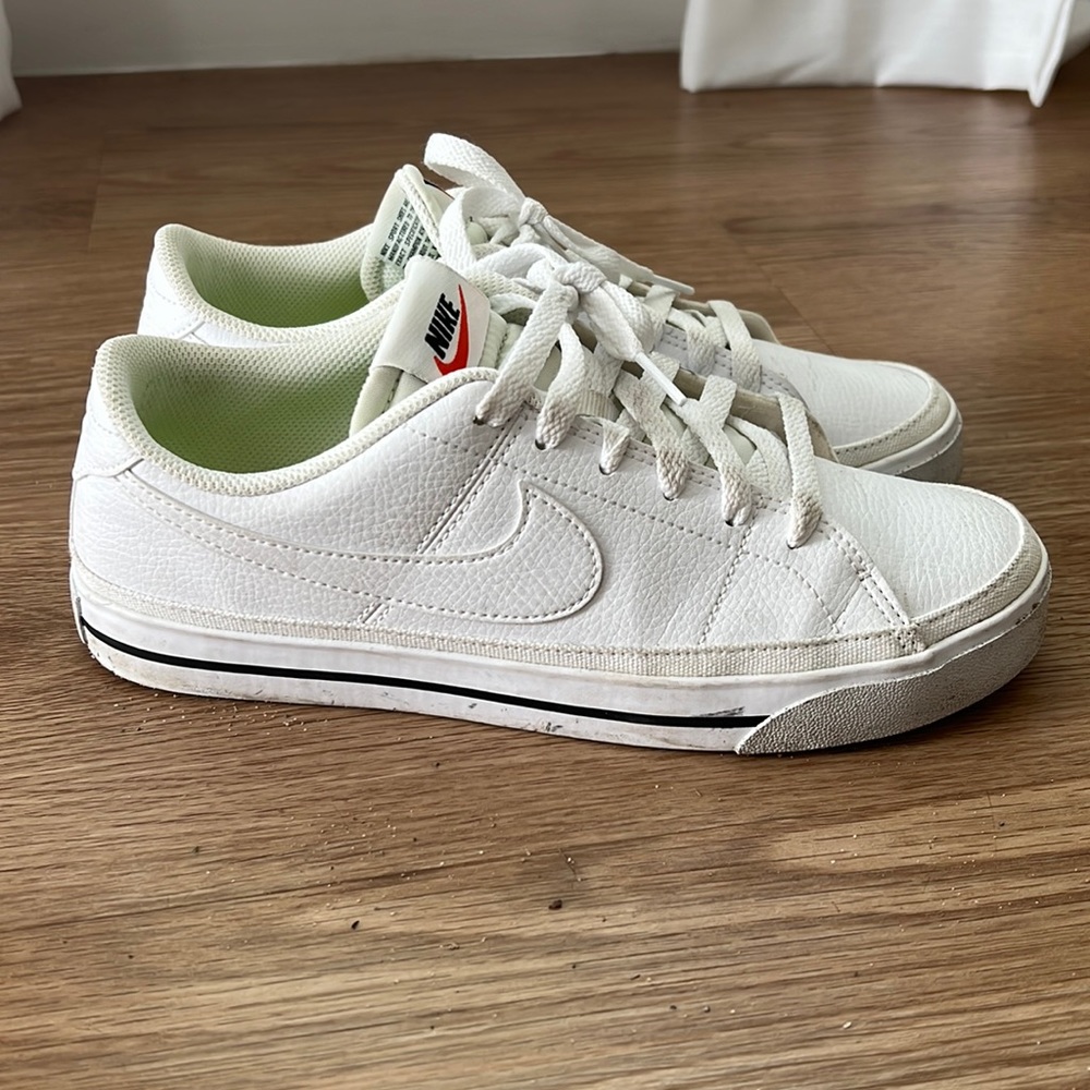 Nike court legacy next nature women’s shoes size 9 all white with black stripe.